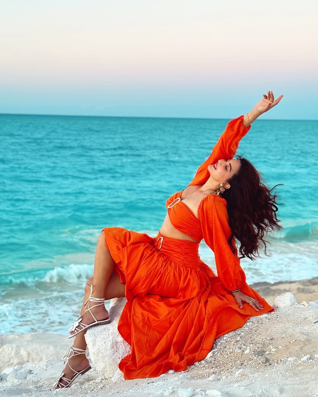 Eshanya Maheshwari orange Dress on beach twirl Lookbook (10)
