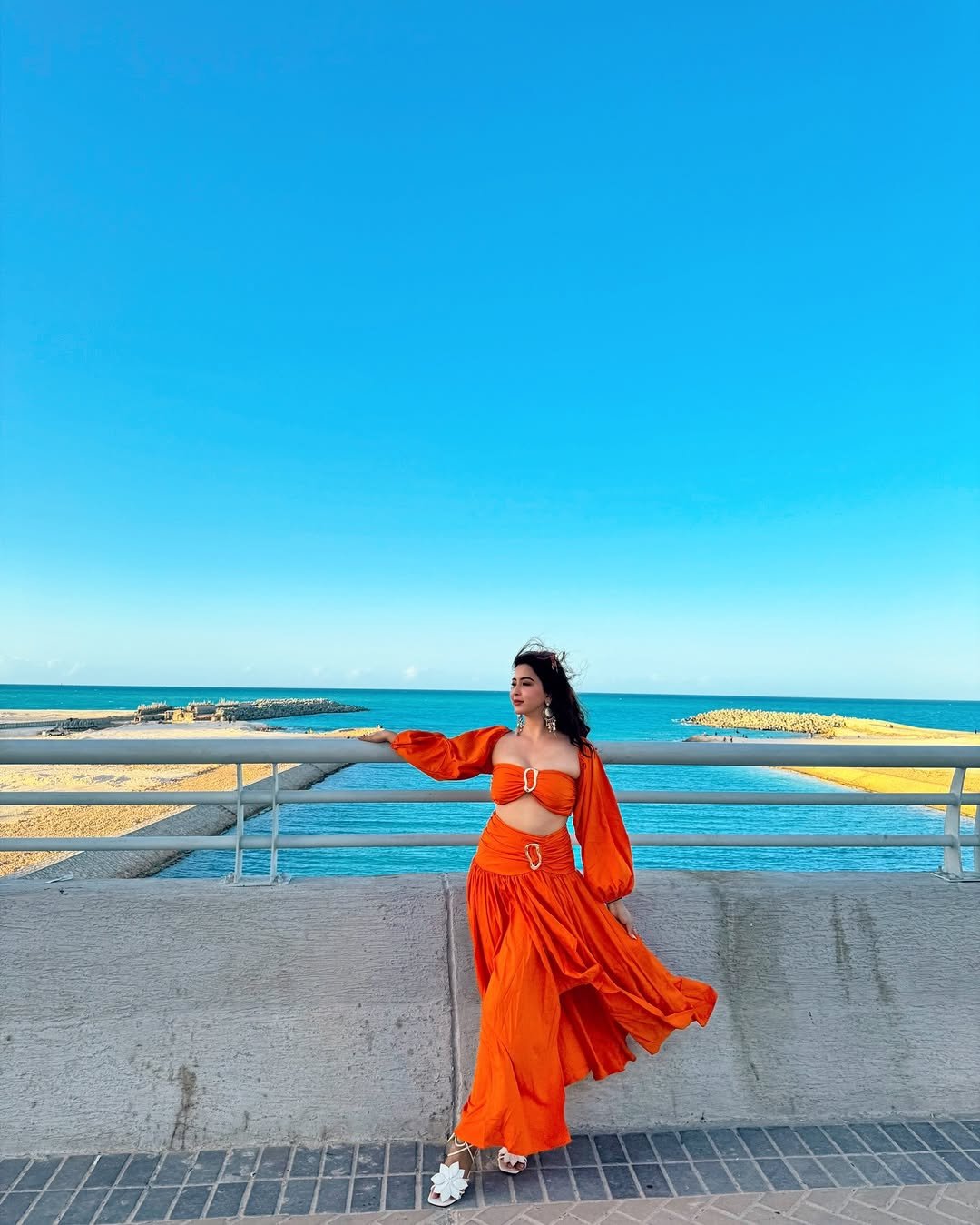 Eshanya Maheshwari orange Dress on beach twirl Lookbook (2)