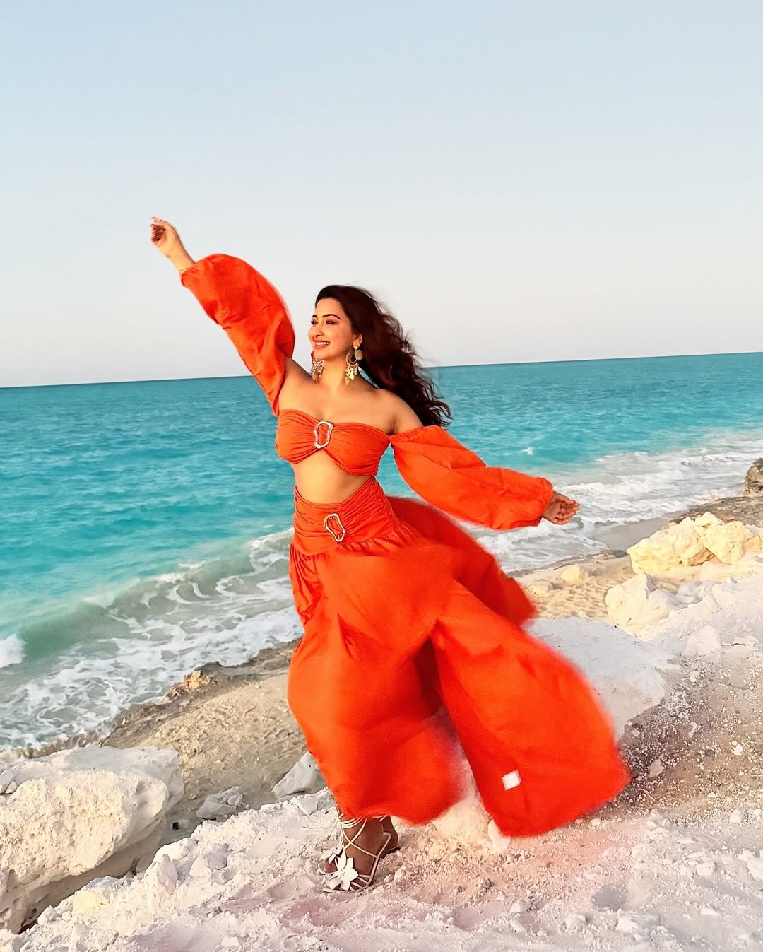 Eshanya Maheshwari orange Dress on beach twirl Lookbook (5)