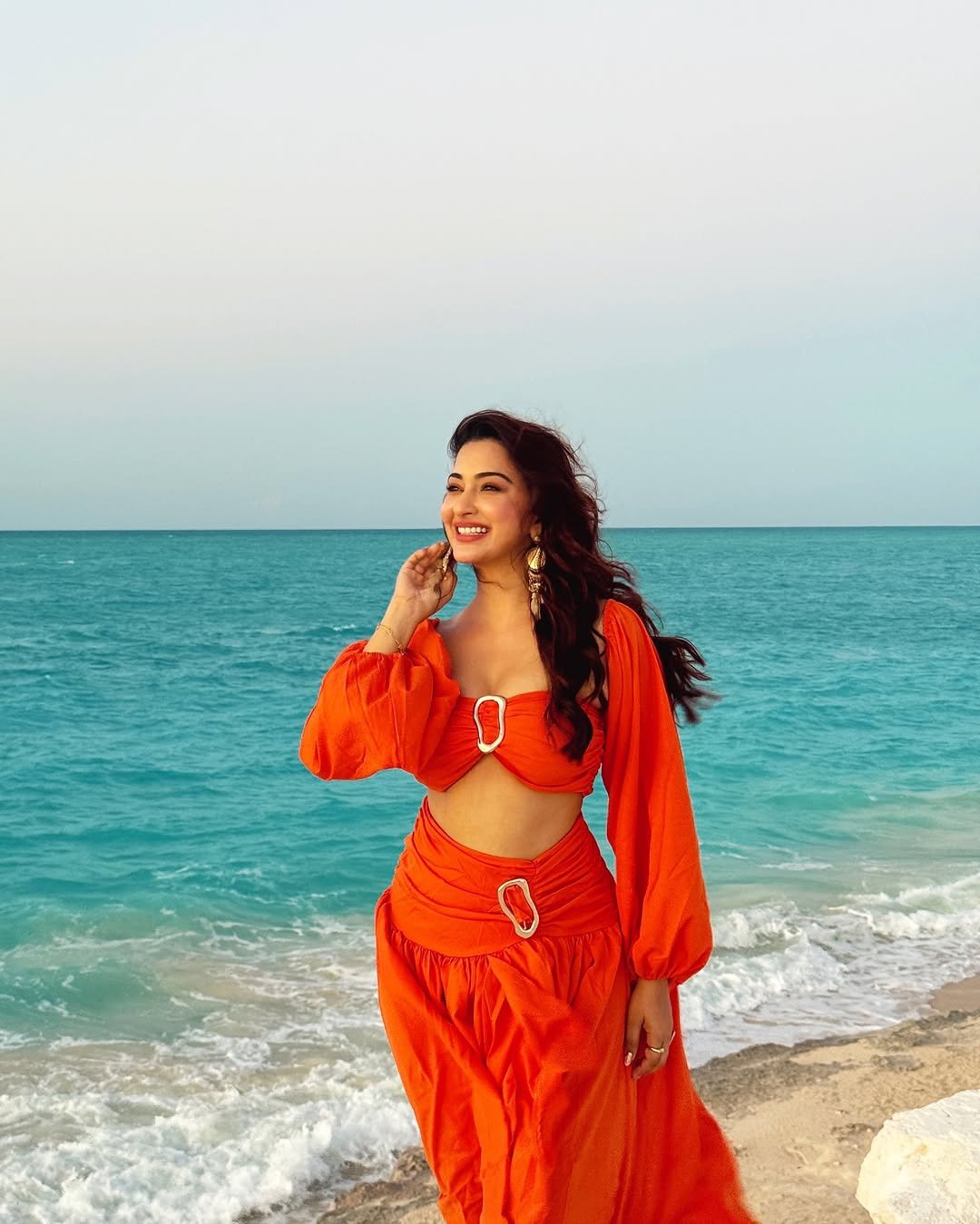 Eshanya Maheshwari orange Dress on beach twirl Lookbook (9)
