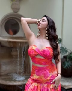 Eshanya Maheshwari stylish gaze in pink dress on modern balcony