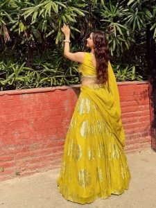 Eshanya Maheshwari yellow mirrorwork lehenga with crop top blouse
