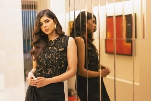 Kalyani Priyadarshan chic pose in modern mirror hallway setting