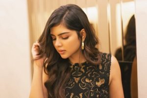 Kalyani Priyadarshan black embellished top in mirrored hallway