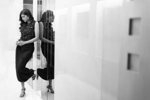 Kalyani Priyadarshan black embellished top in mirrored hallway