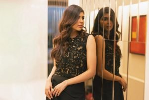 Kalyani Priyadarshan chic pose in modern mirror hallway setting