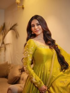 Nabha Natesh gentle expression in soft-focused mustard ethnic dress