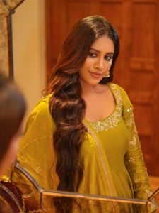 Ethereal photography of Nabha Natesh in warm mustard anarkali