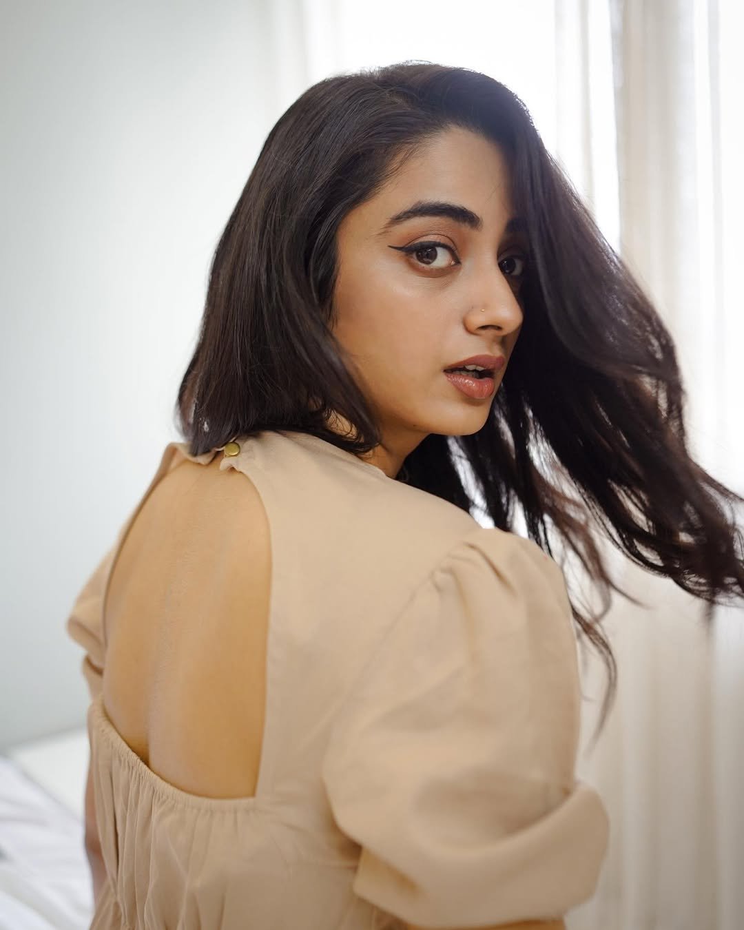 Namitha Pramod beige open back dress soft glance Photos (13)