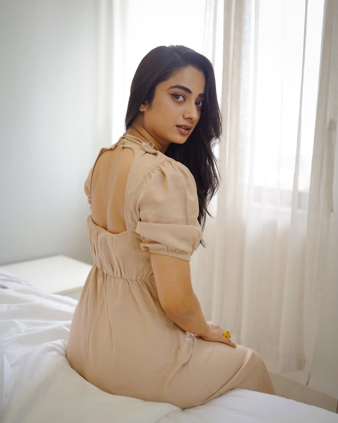 Namitha Pramod beige open back dress soft glance Photos (14)