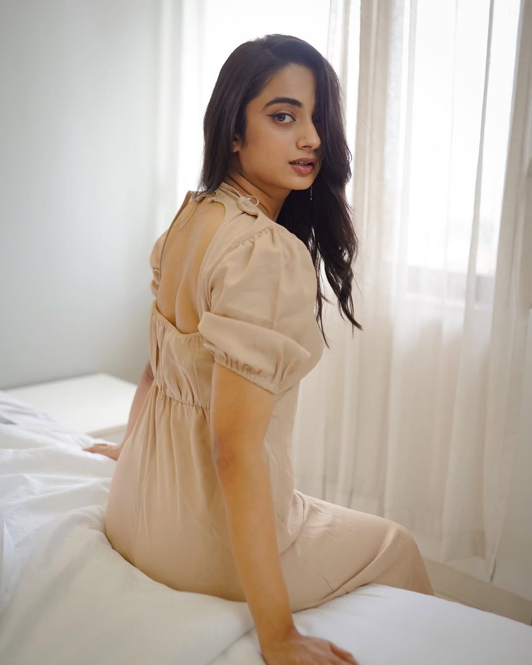 Namitha Pramod beige open back dress soft glance Photos (7)