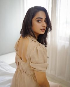 Back detail of Namitha Pramod beige dress design closeup