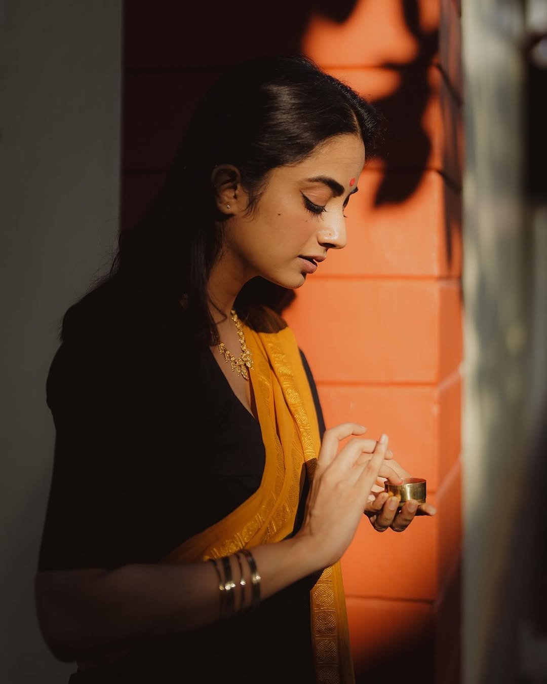 Namitha Pramod black saree mustard border swing glance Photos (5)