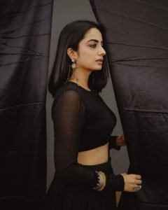 Studio lighting creating shadows on Namitha Pramod sheer lehenga