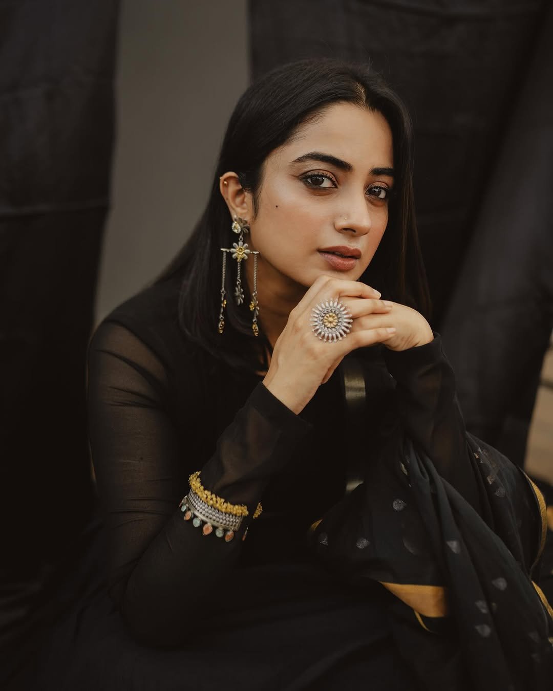 Studio lighting creating shadows on Namitha Pramod sheer lehenga