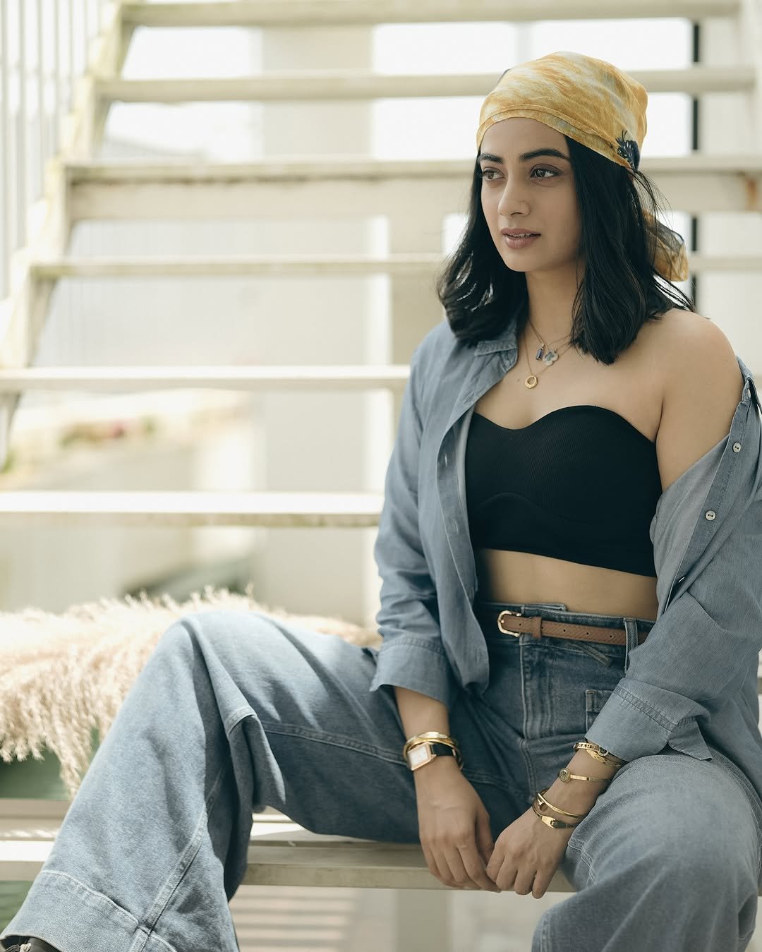 Namitha Pramod denim co-ord black bustier bandana rooftop steps Photoshoot (1)