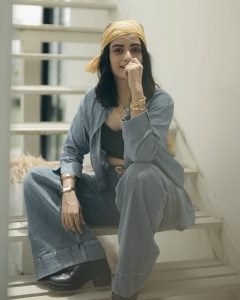 Namitha Pramod denim co-ord with black bustier on rooftop steps