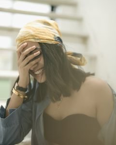 Namitha Pramod denim co-ord with black bustier on rooftop steps