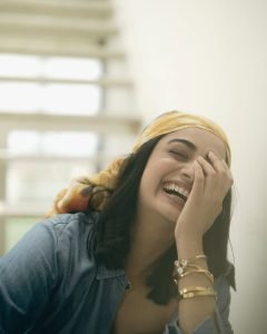 Namitha Pramod denim co-ord with black bustier on rooftop steps