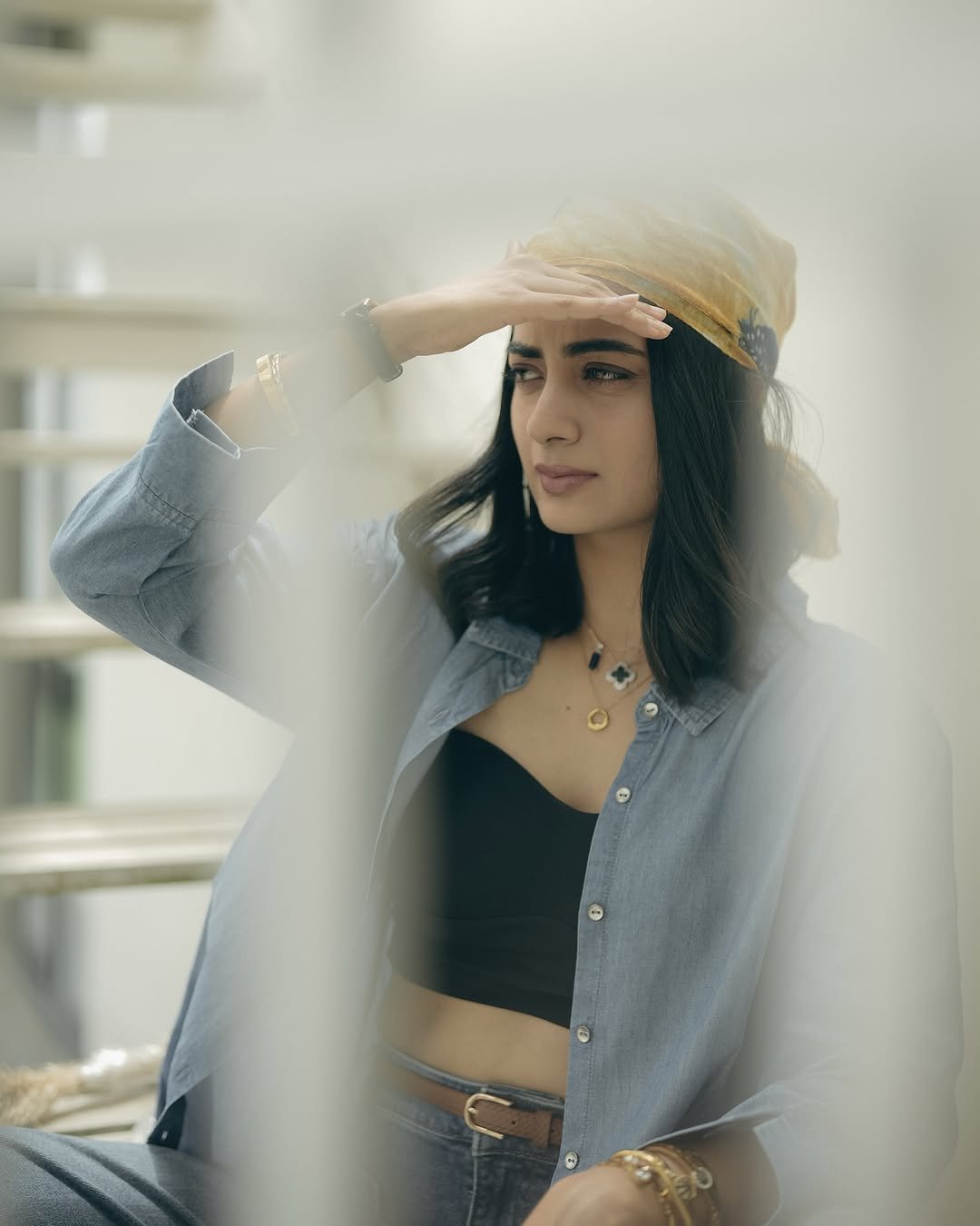 Namitha Pramod denim co-ord black bustier bandana rooftop steps Photoshoot (3)