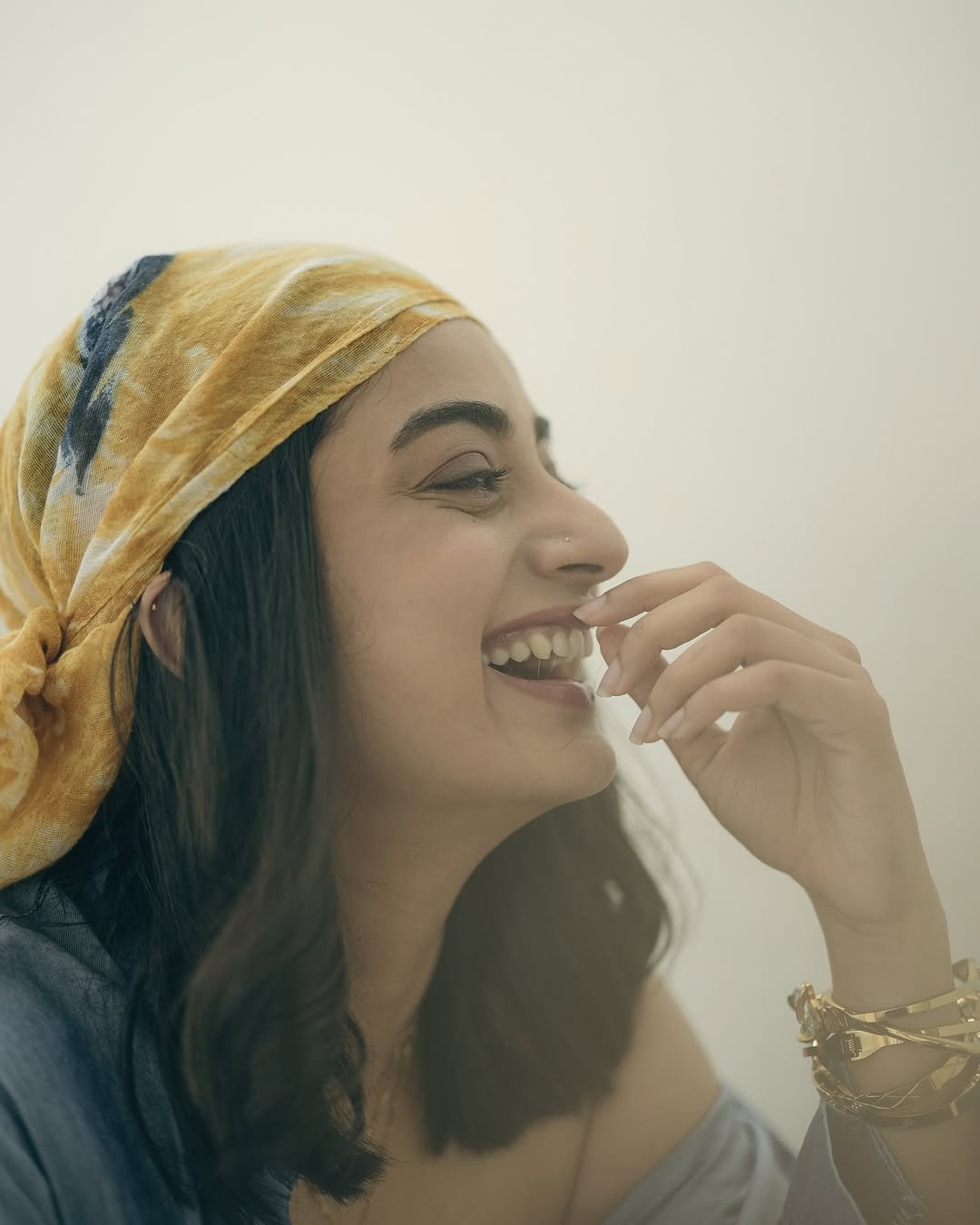 Namitha Pramod denim co-ord black bustier bandana rooftop steps Photoshoot (7)