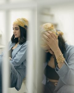 Urban rooftop setting for Namitha Pramod trendy denim outfit