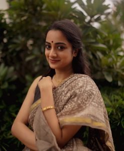 Namitha Pramod closeup portrait in elegant black saree