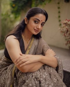 Namitha Pramod closeup portrait in elegant black saree