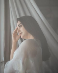 Namitha Pramod ivory white saree cozy home interior setting