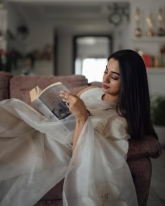 Namitha Pramod ivory white saree cozy home interior setting