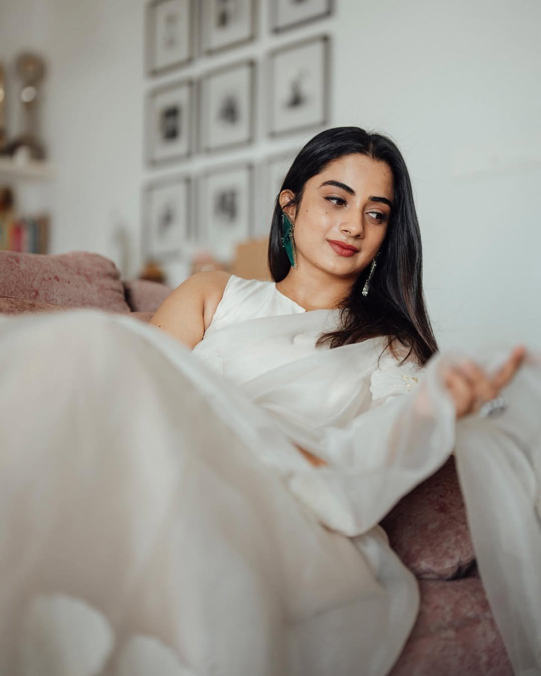 Namitha Pramod ivory white saree cozy home interior setting