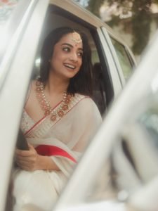 Luxurious car interior setting for Namitha Pramod saree portrait