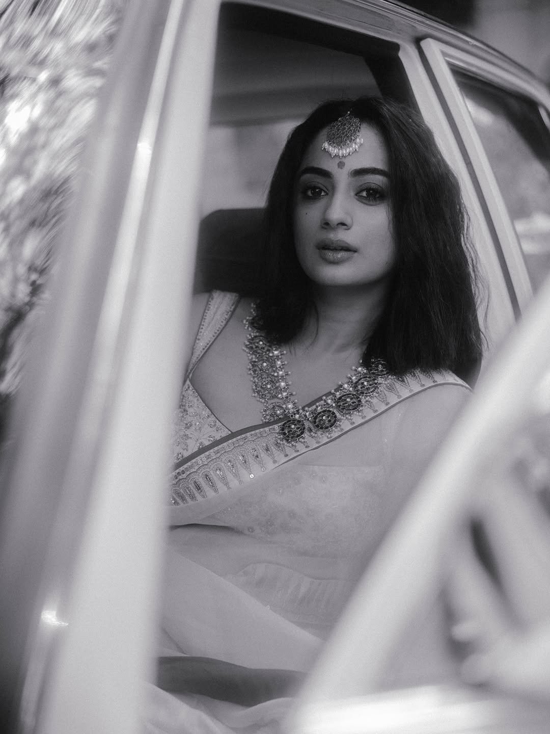 Namitha Pramod ivory saree rose-gold jewelry car cabin Portrait (3)