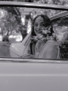 Namitha Pramod ivory saree with rose-gold jewelry in car cabin