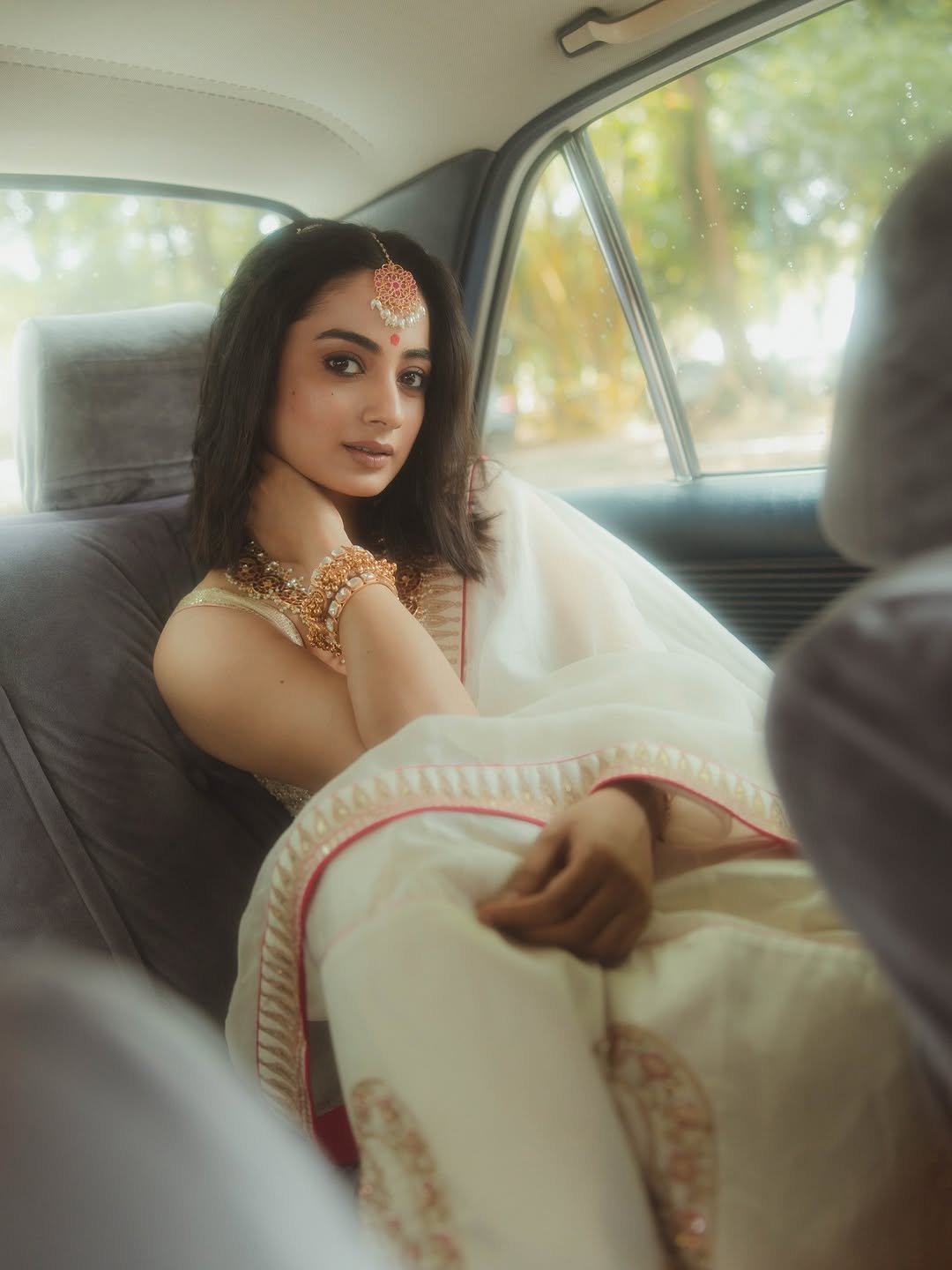 Namitha Pramod ivory saree rose-gold jewelry car cabin Portrait (35)