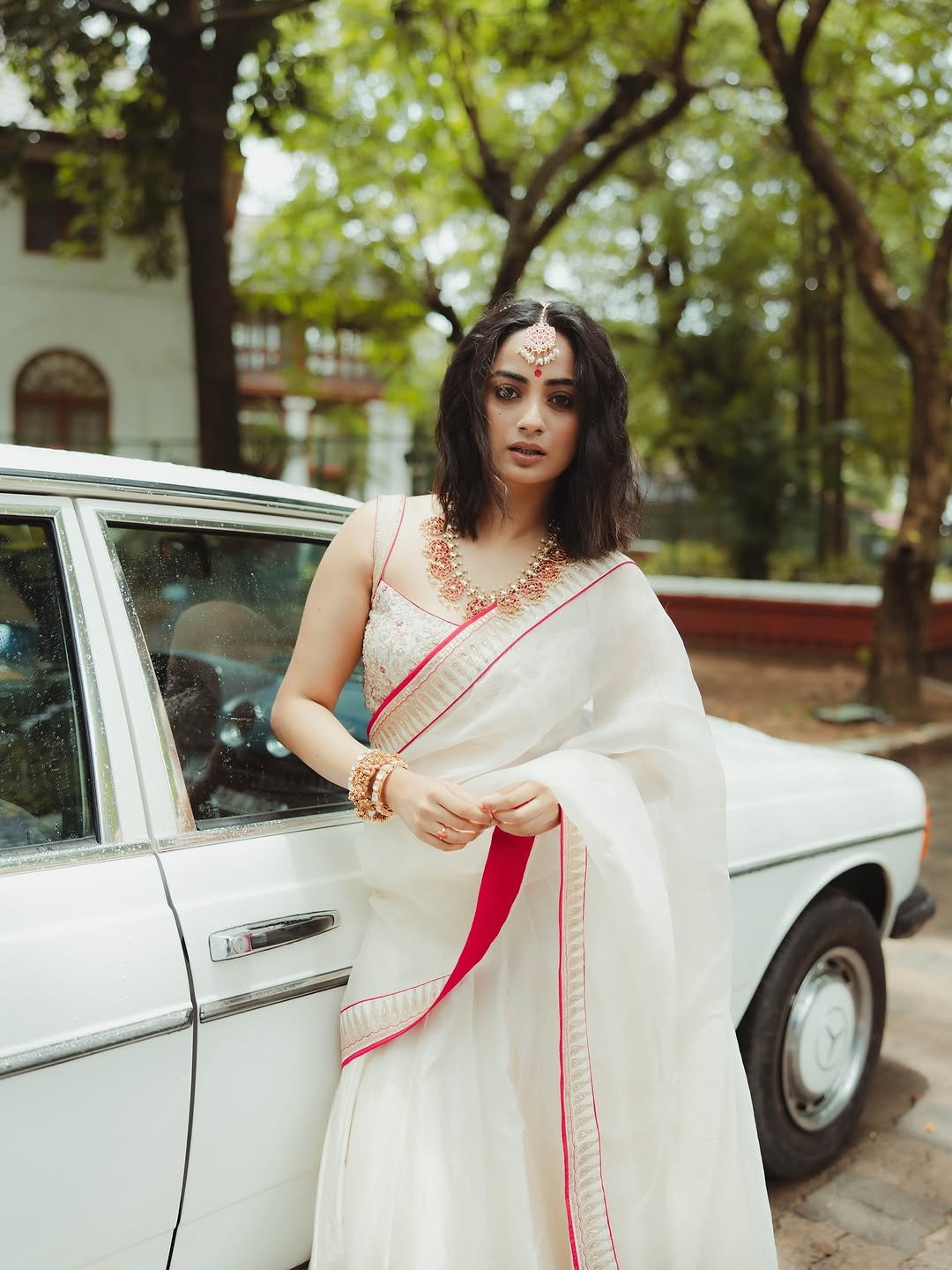 Namitha Pramod ivory saree rose-gold jewelry car cabin Portrait (36)