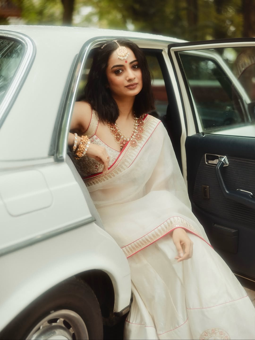 Namitha Pramod ivory saree rose-gold jewelry car cabin Portrait (8)