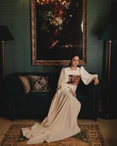 Namitha Pramod ivory statement blouse in vintage decorated lounge