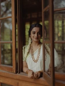 Natural window lighting on Namitha Pramod traditional jasmine flowers