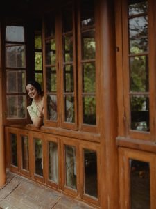 Namitha Pramod gentle smile in white saree with fresh gajra