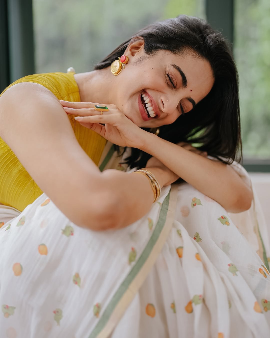 Namitha Pramod lemon blouse white printed saree garden smile Photos (10)