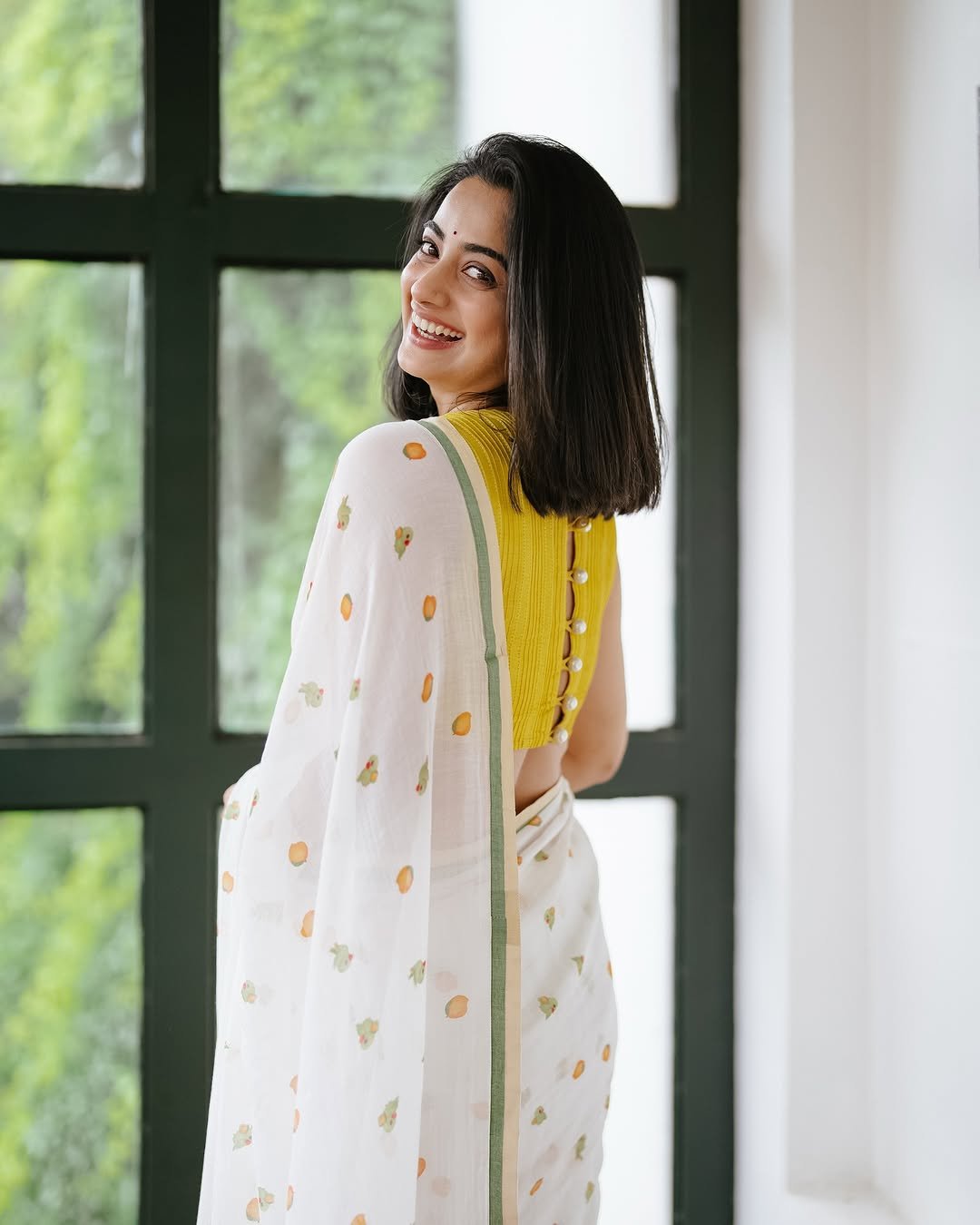 Namitha Pramod lemon blouse white printed saree garden smile Photos (12)