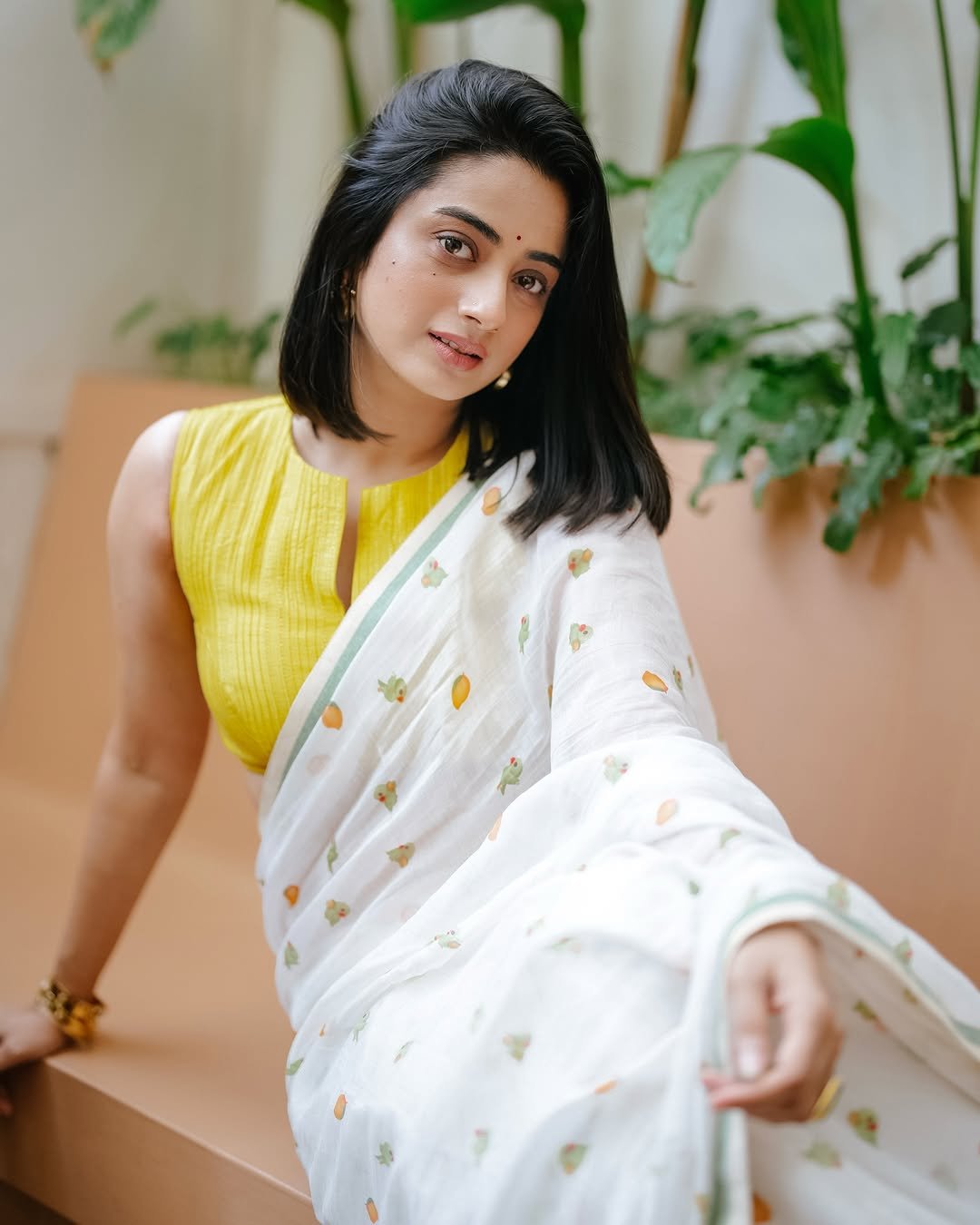 Namitha Pramod lemon blouse white printed saree garden smile Photos (15)
