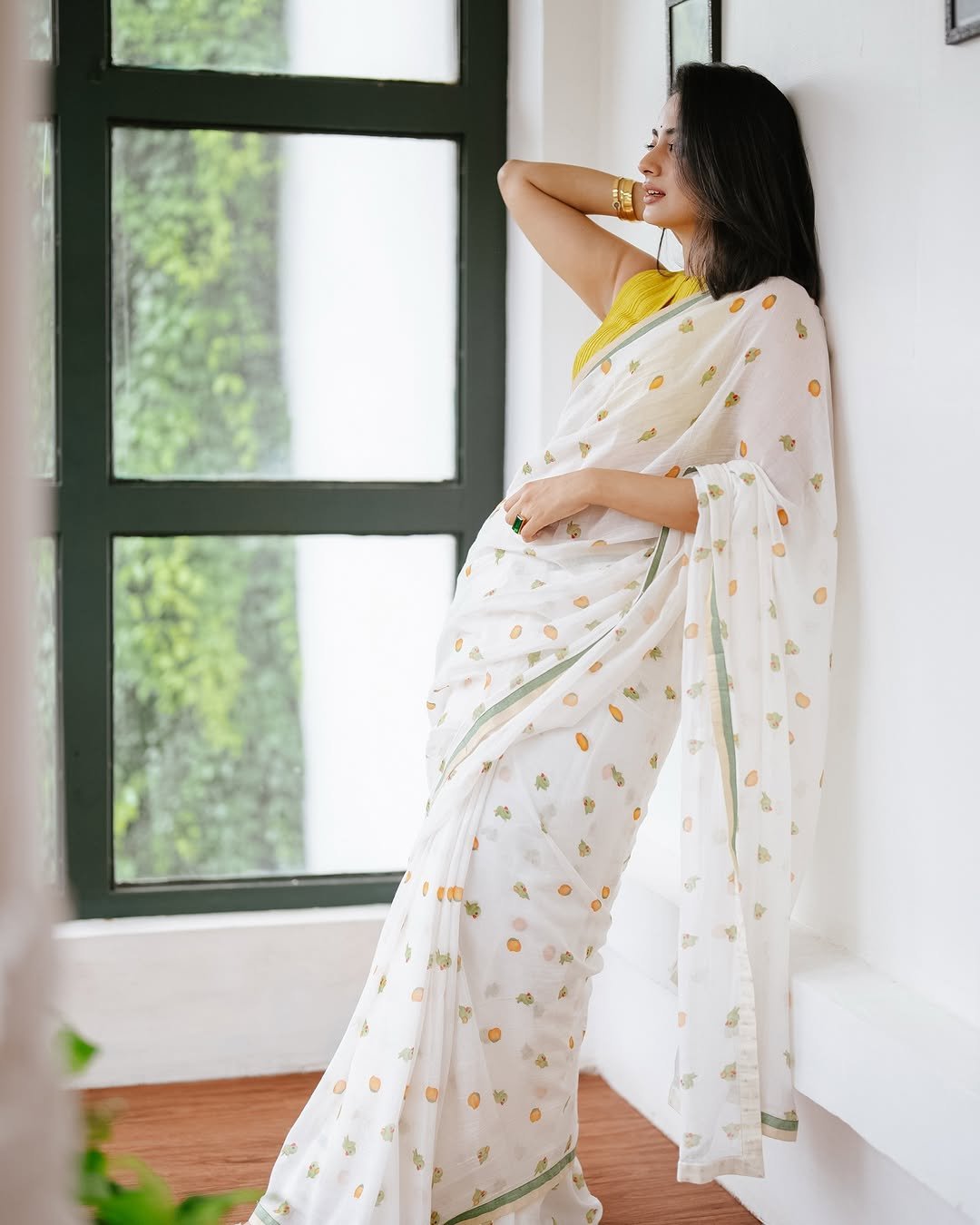 Namitha Pramod lemon blouse white printed saree garden smile Photos (7)