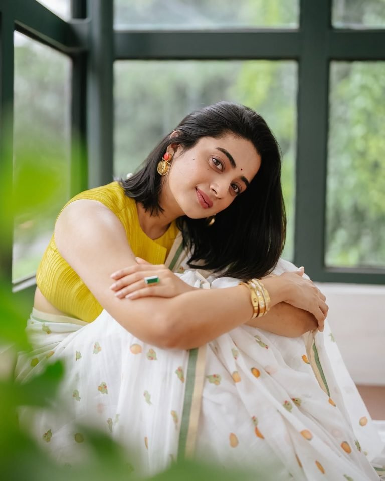 Bright smile from Namitha Pramod in fresh yellow and white saree