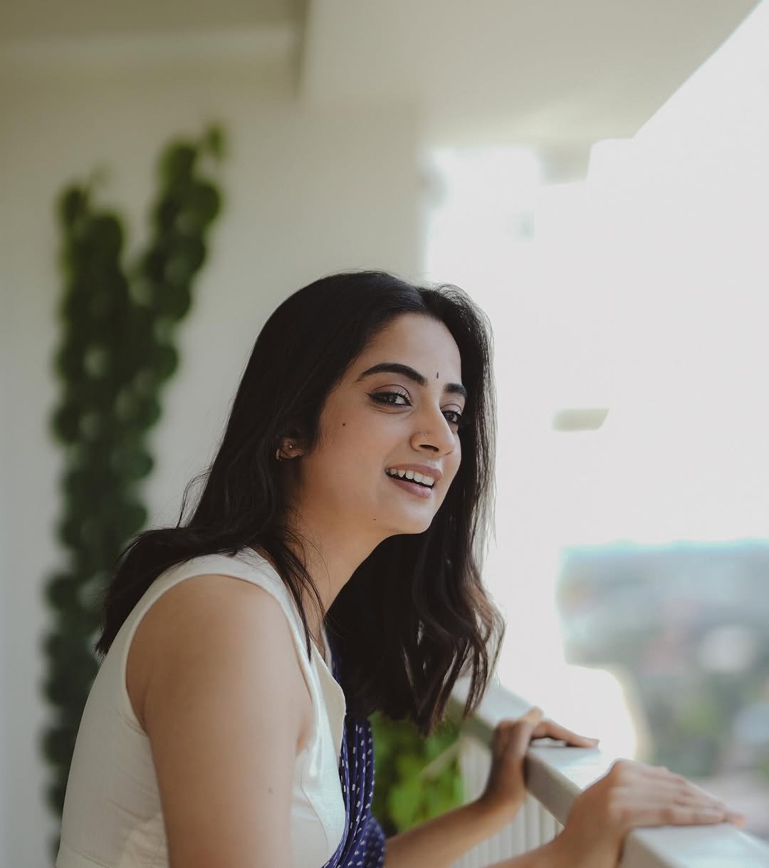 Namitha Pramod navy saree balcony glow Photos (4)