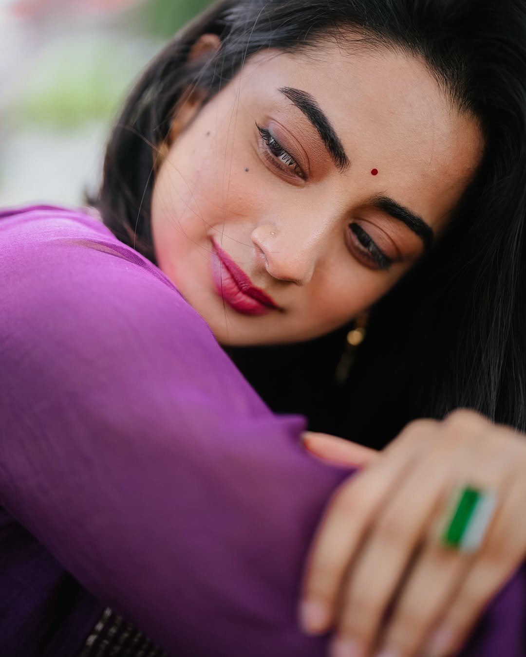 Namitha Pramod purple pleated suit garden bench radiant smile Photos (14)