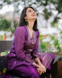Namitha Pramod radiant smile in purple pleated salwar suit