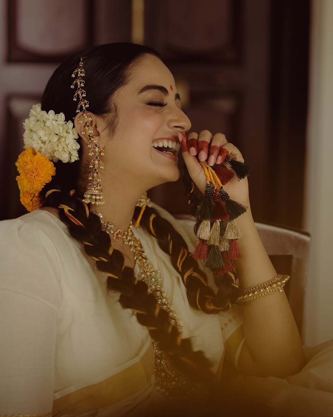 Namitha Pramod traditional braids jasmine gajra golden hour Photoshoot (1)