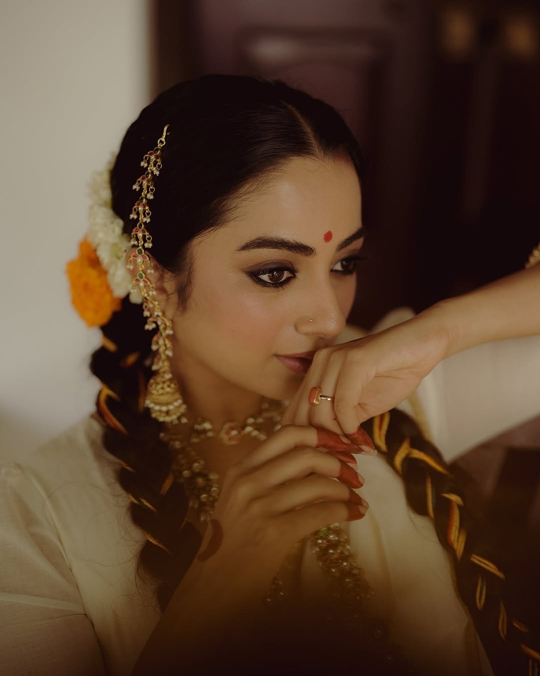 Namitha Pramod traditional braids jasmine gajra golden hour Photoshoot (10)